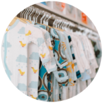 closeup of children's clothes hanging on rack